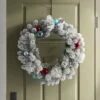 24" Flocked Pine With Ornaments Artificial Christmas Wreath Green/Brights - Wondershop™